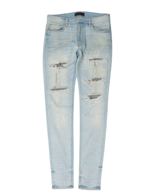 Distressed Zebra Print Repaired Denim Jeans
