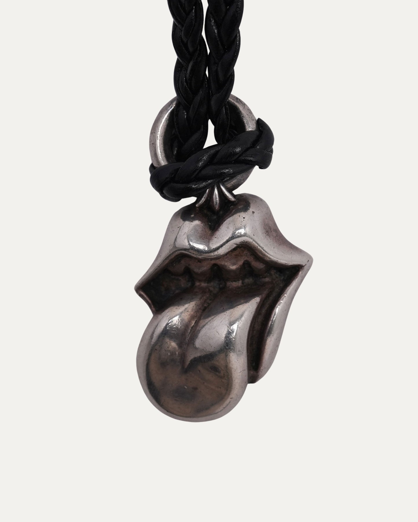 Rolling Stones Pendant on Braided Leather Necklace