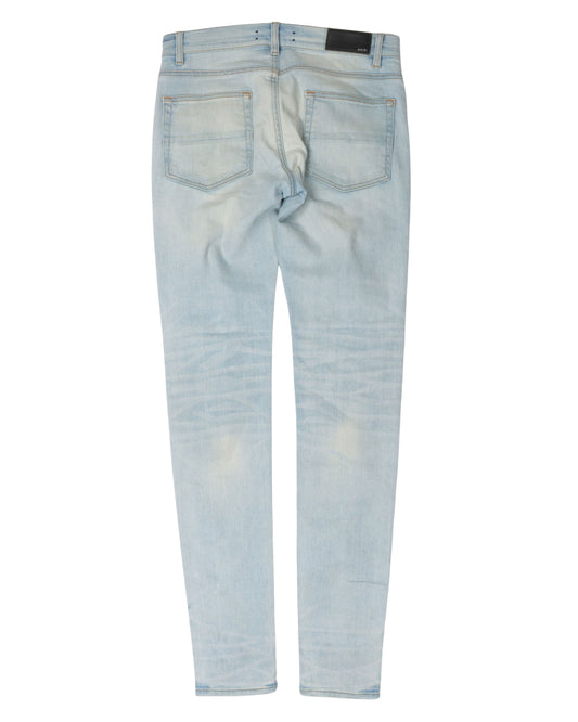 Distressed Zebra Print Repaired Denim Jeans