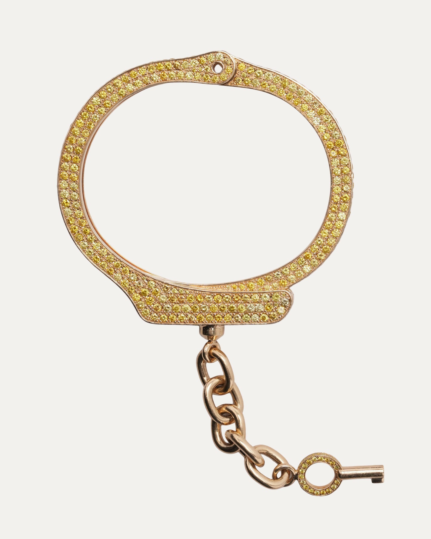 Pharrell's Gold and Yellow Diamond Handcuff Bracelet