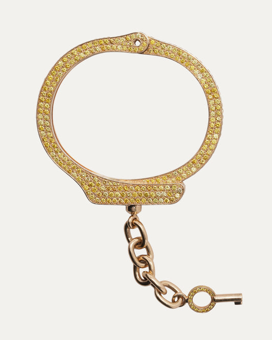 Pharrell's Gold and Yellow Diamond Handcuff Bracelet