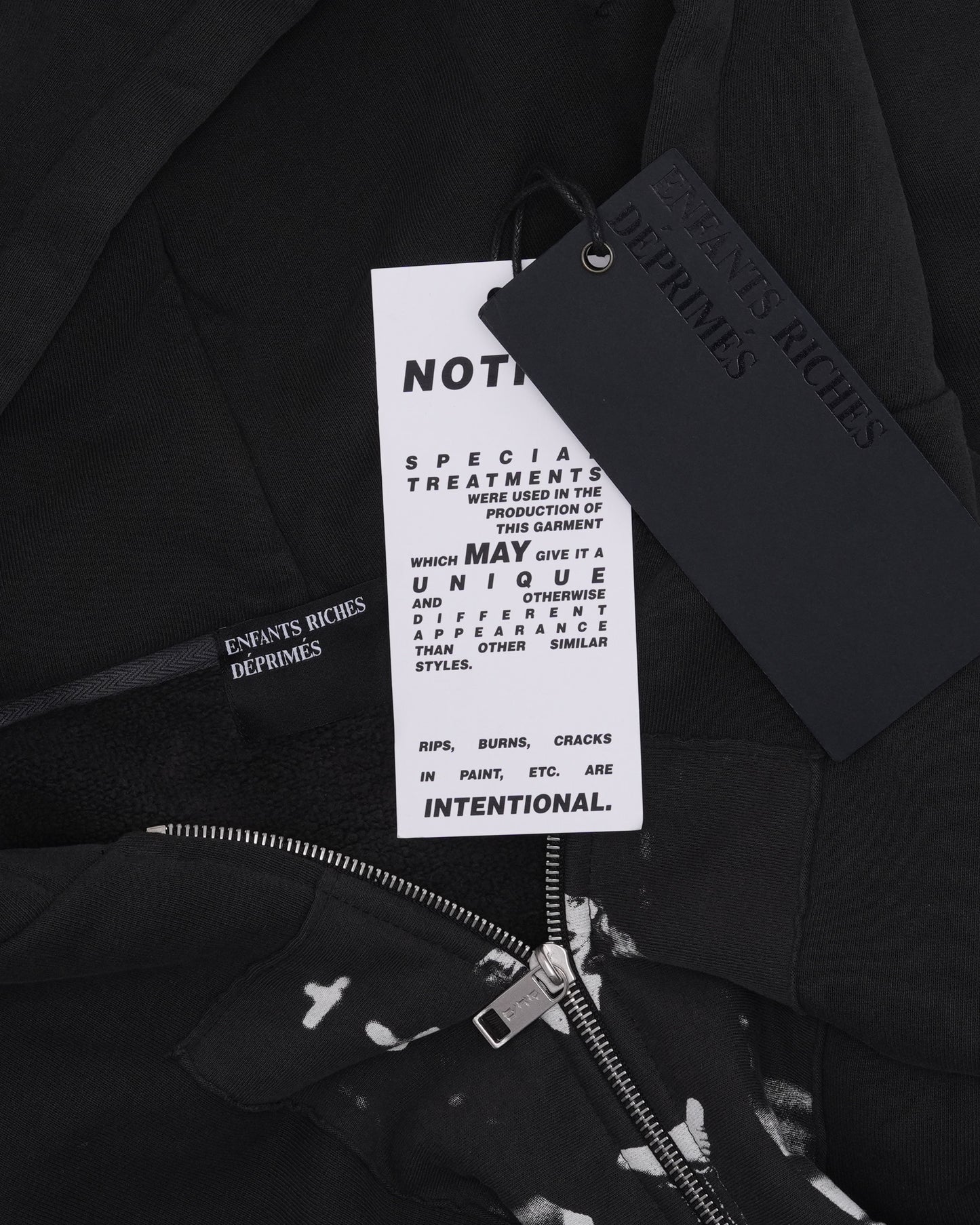 Artist Defends Baggy Assemblage Zip Up Hoodie