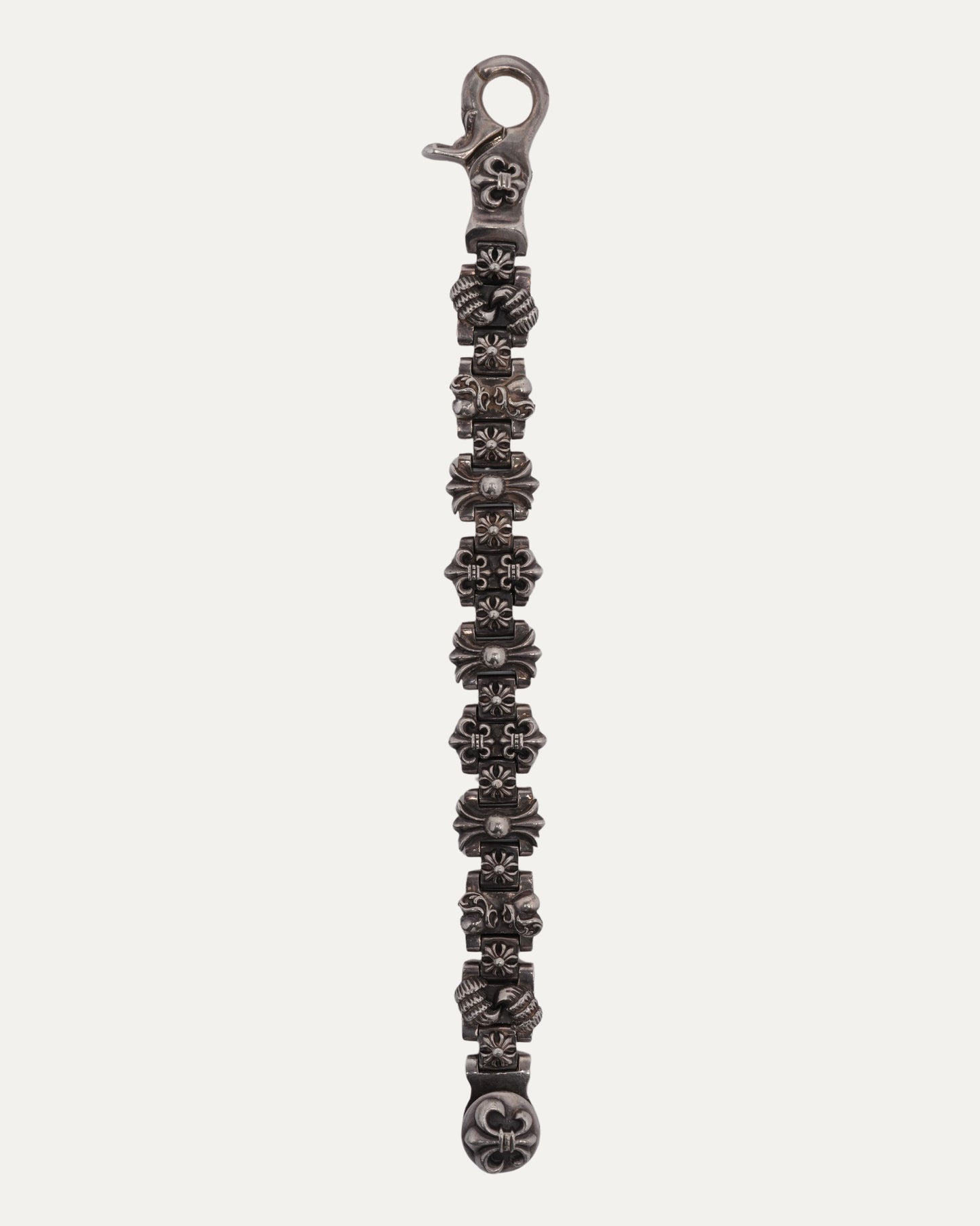 Fleur Lobster Clasp Multi Motif Bracelet