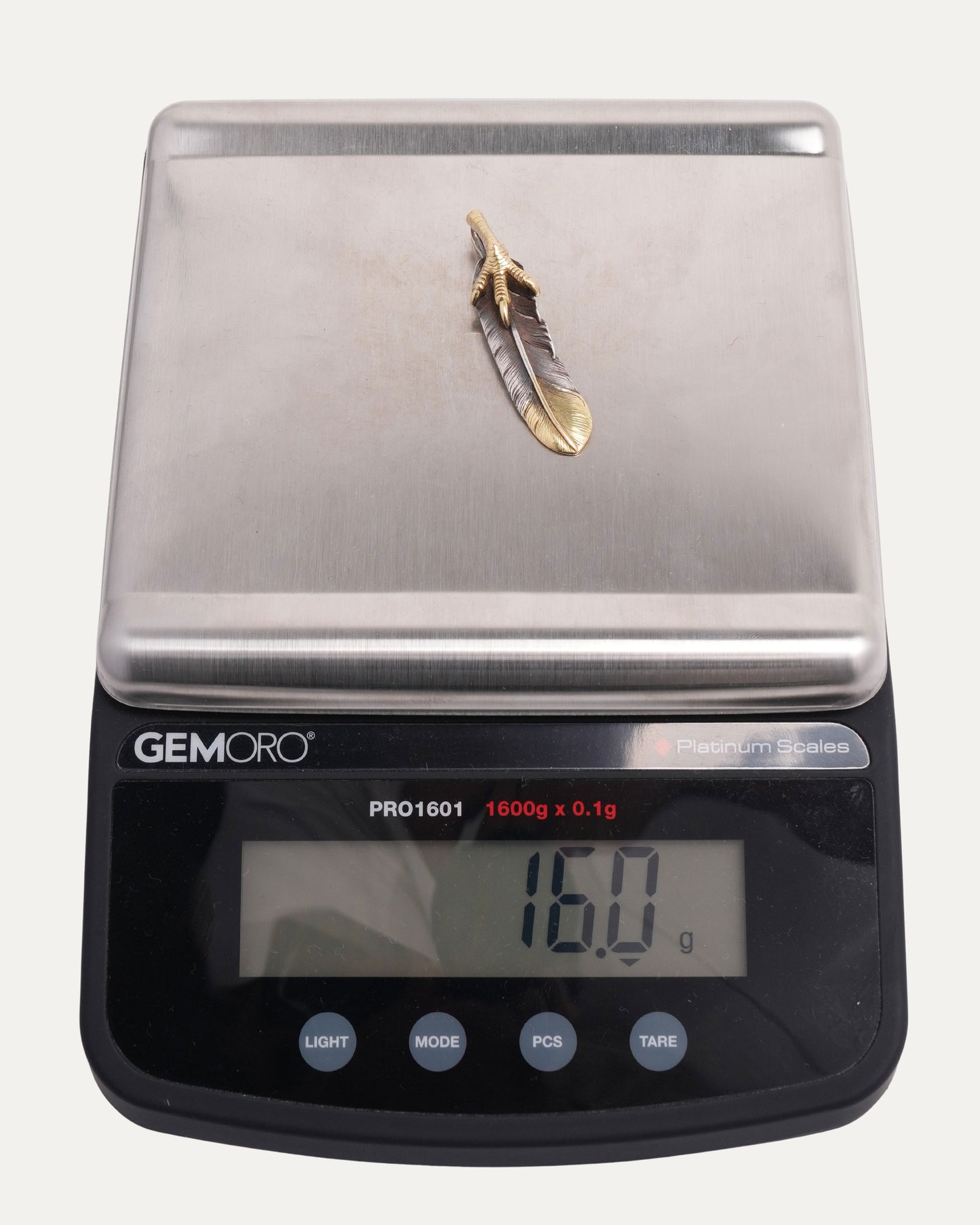 Silver Gold Feather and Talon Pendant