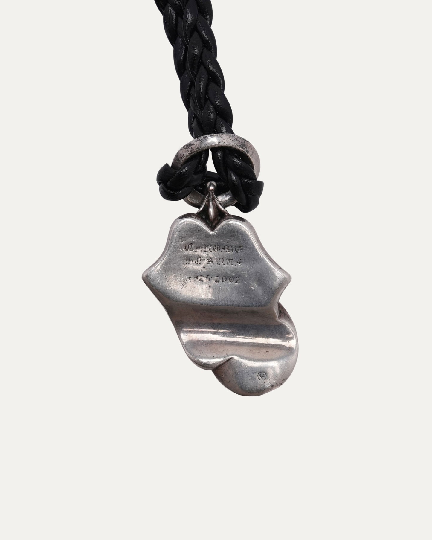 Rolling Stones Pendant on Braided Leather Necklace
