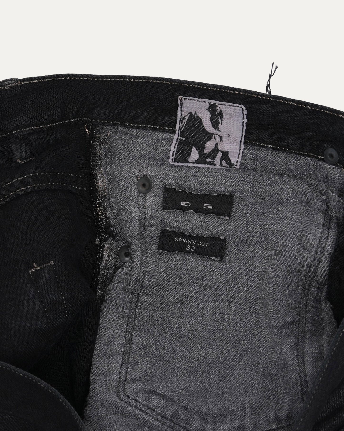 Sphinx Cut Raw Hem Denim Shorts