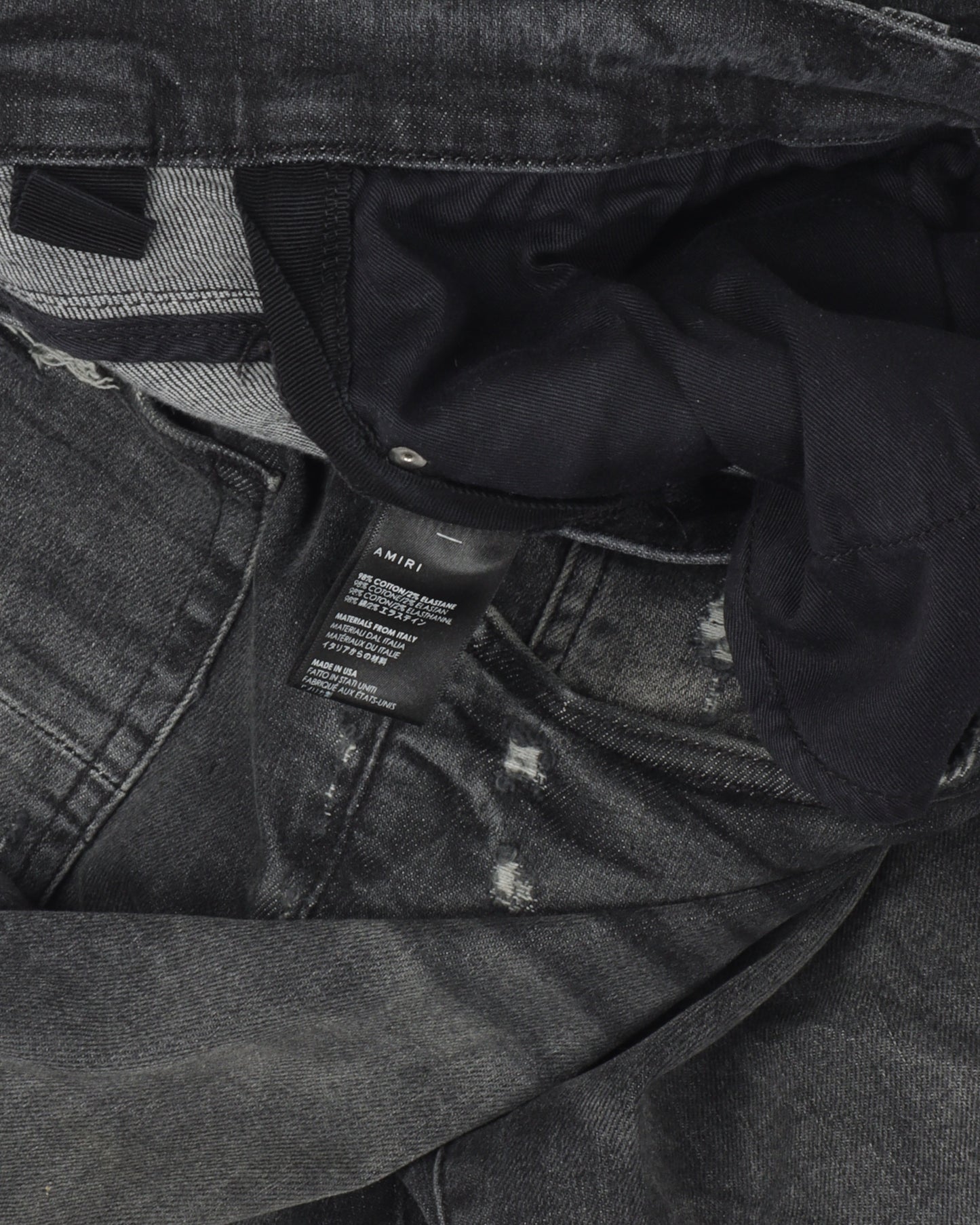 Lightly Distressed Faded Denim Jeans