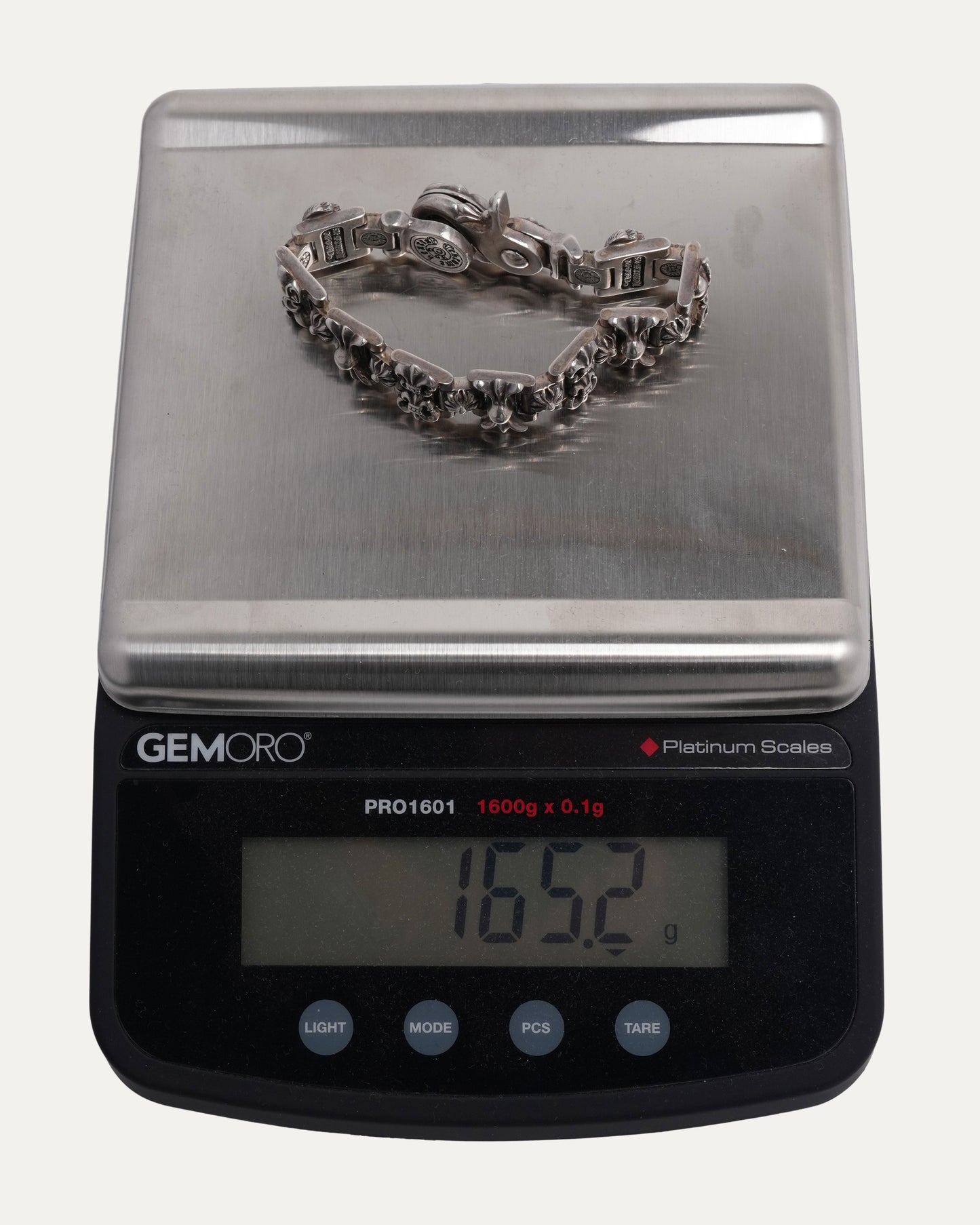 Fleur Lobster Clasp Multi Motif Bracelet