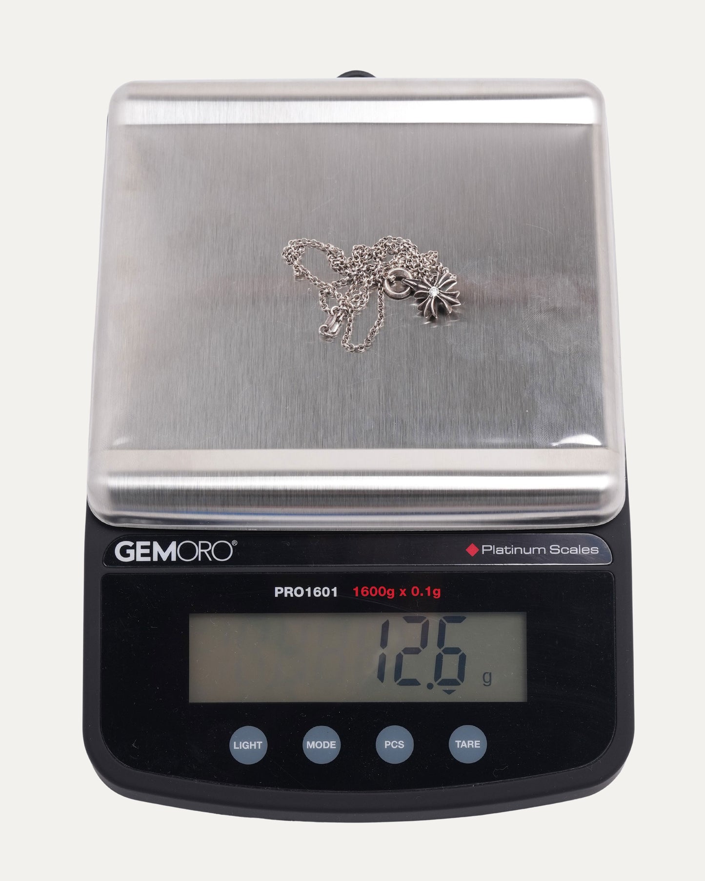 Diamond Tiny Plus Pendant on Roll Chain