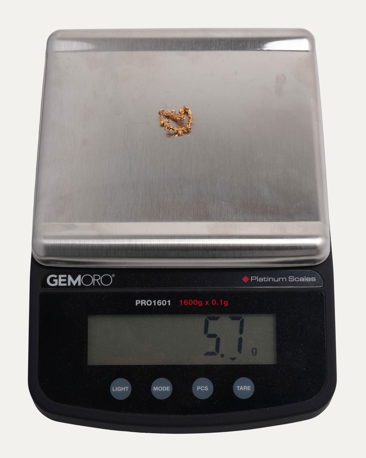 Gold and Diamond Tiny E Ring