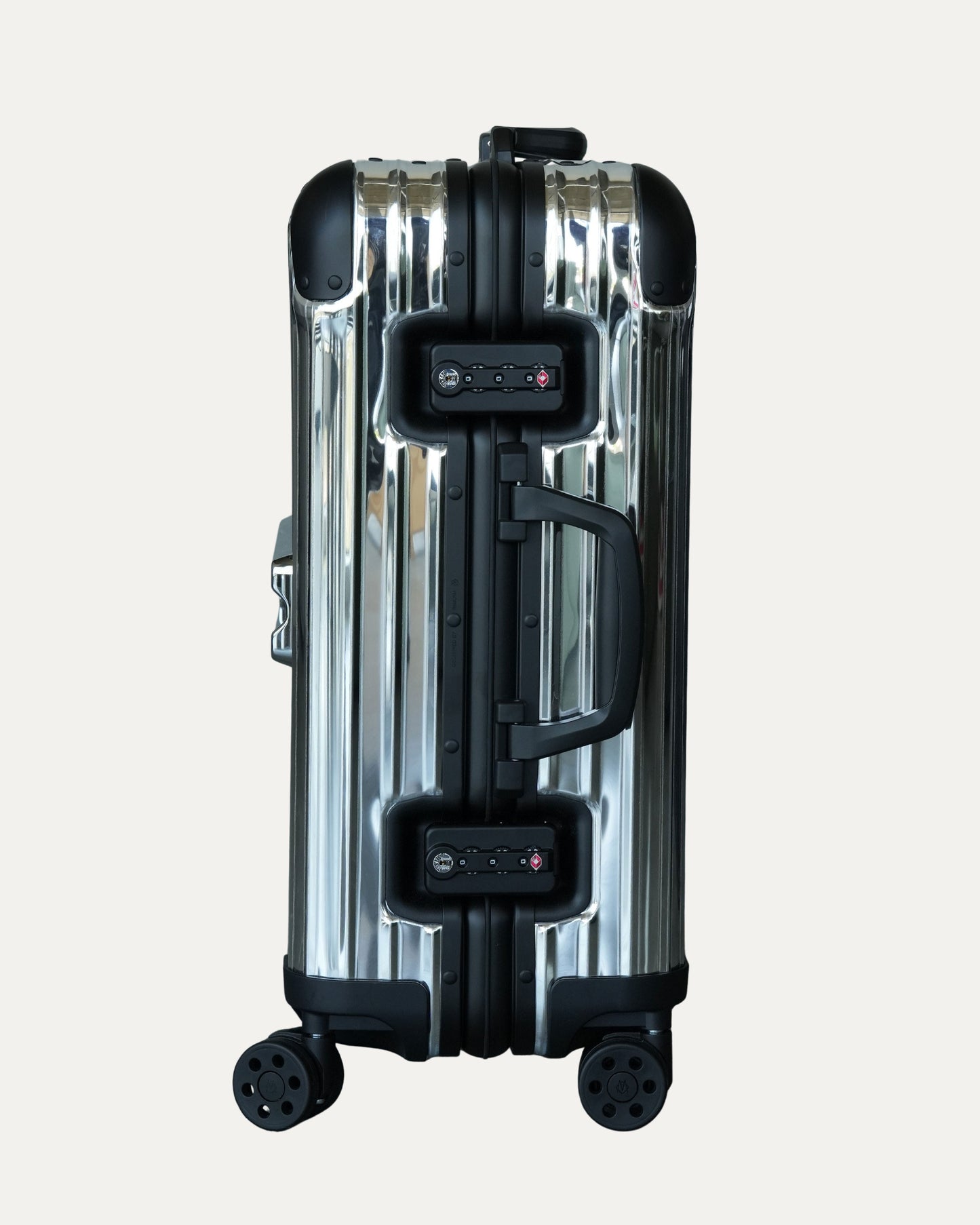 Genius Rimowa "Reflection" Carry On Suitcase