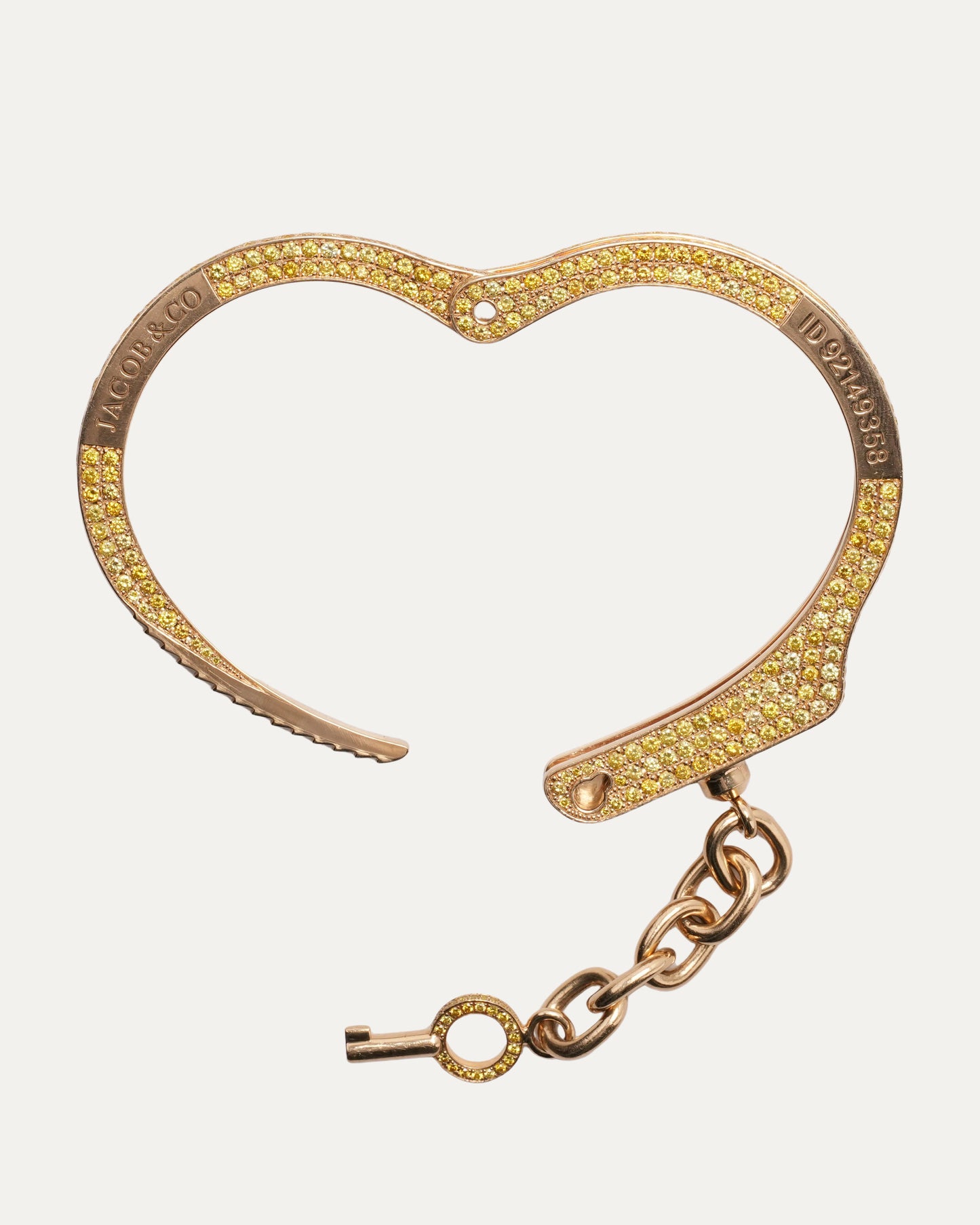Pharrell's Gold and Yellow Diamond Handcuff Bracelet
