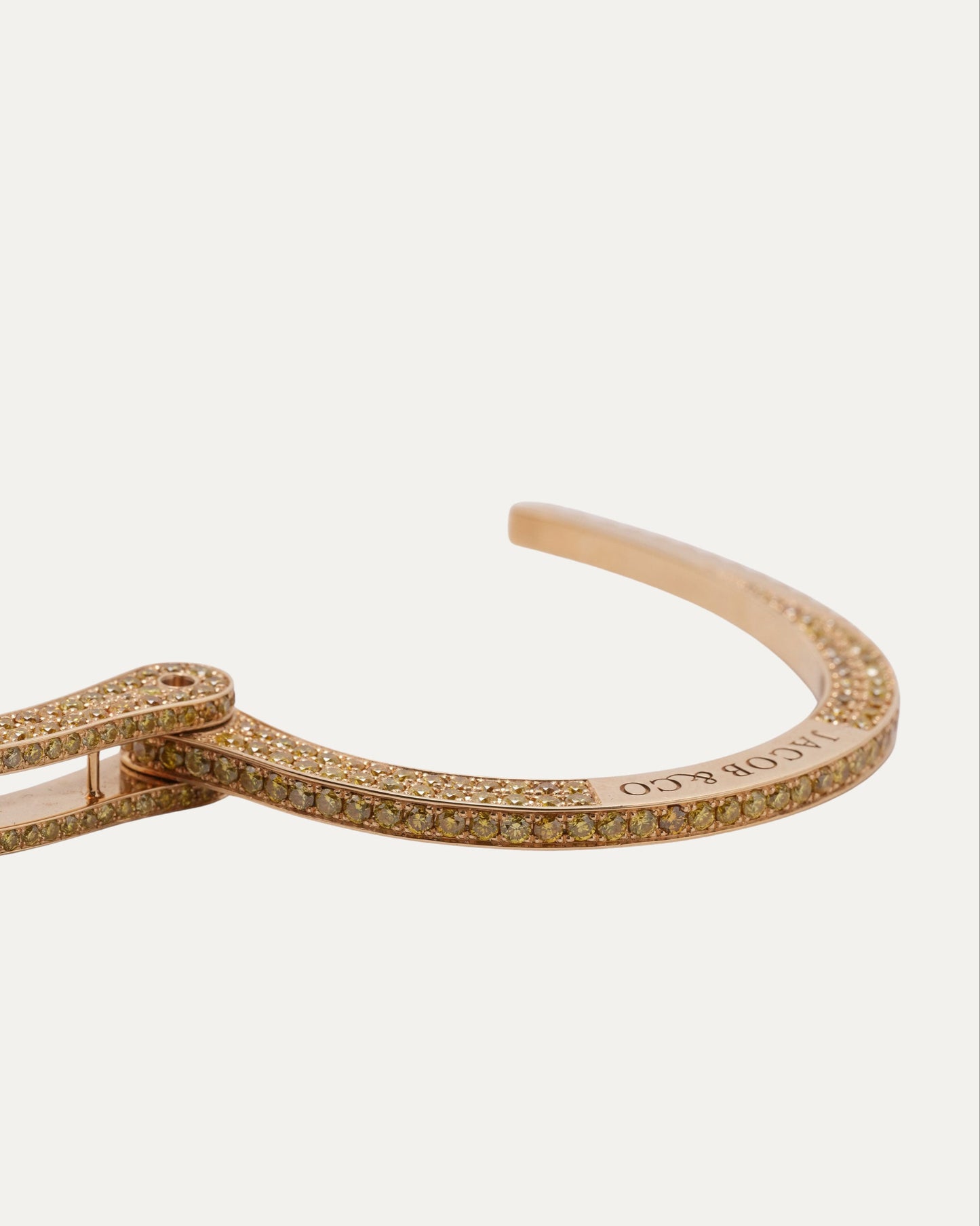 Pharrell's Gold and Yellow Diamond Handcuff Bracelet