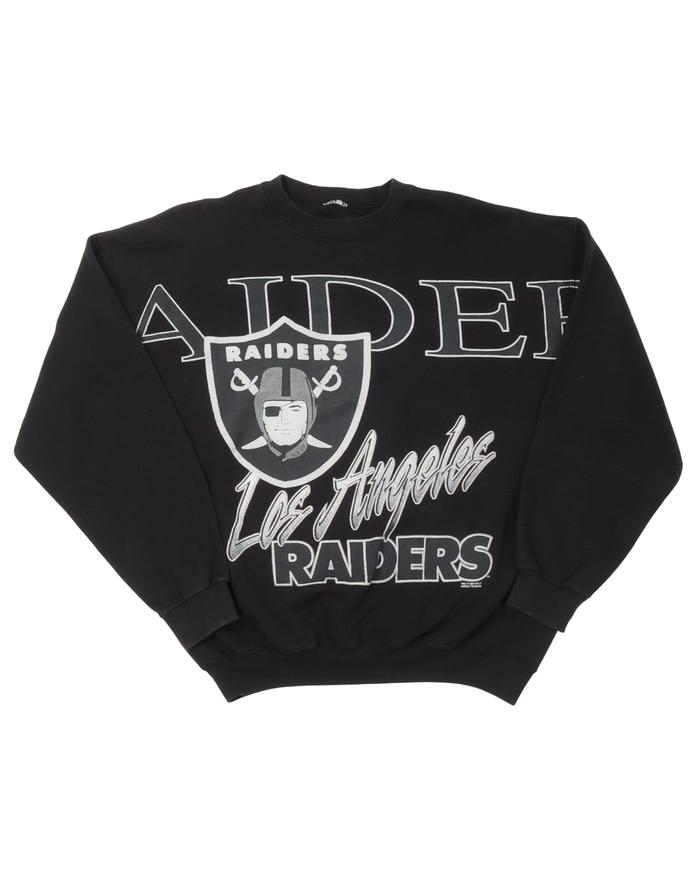 1994 Raiders vintage NFL hoodie. Tagged as a large