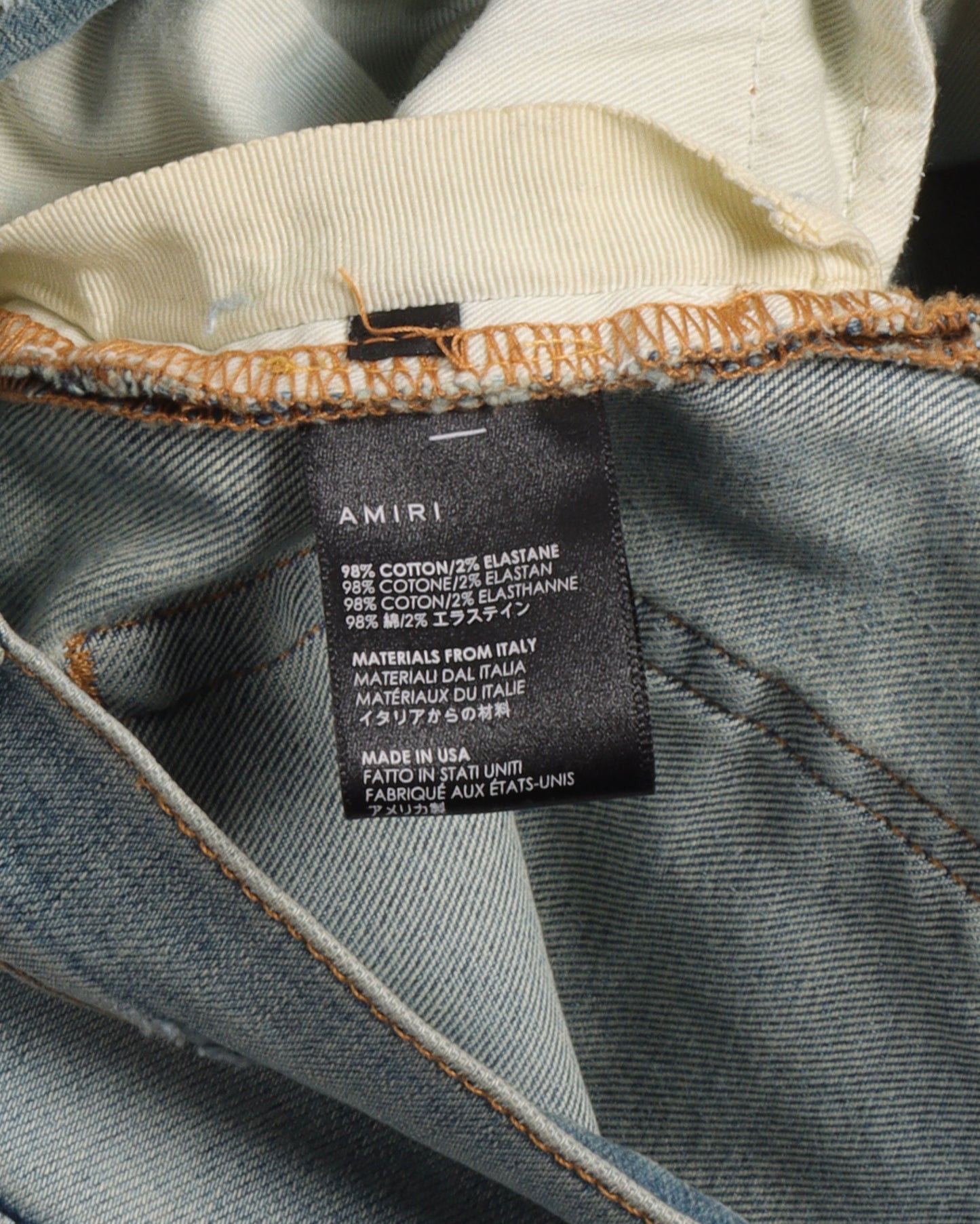 Faded Distressed Jeans