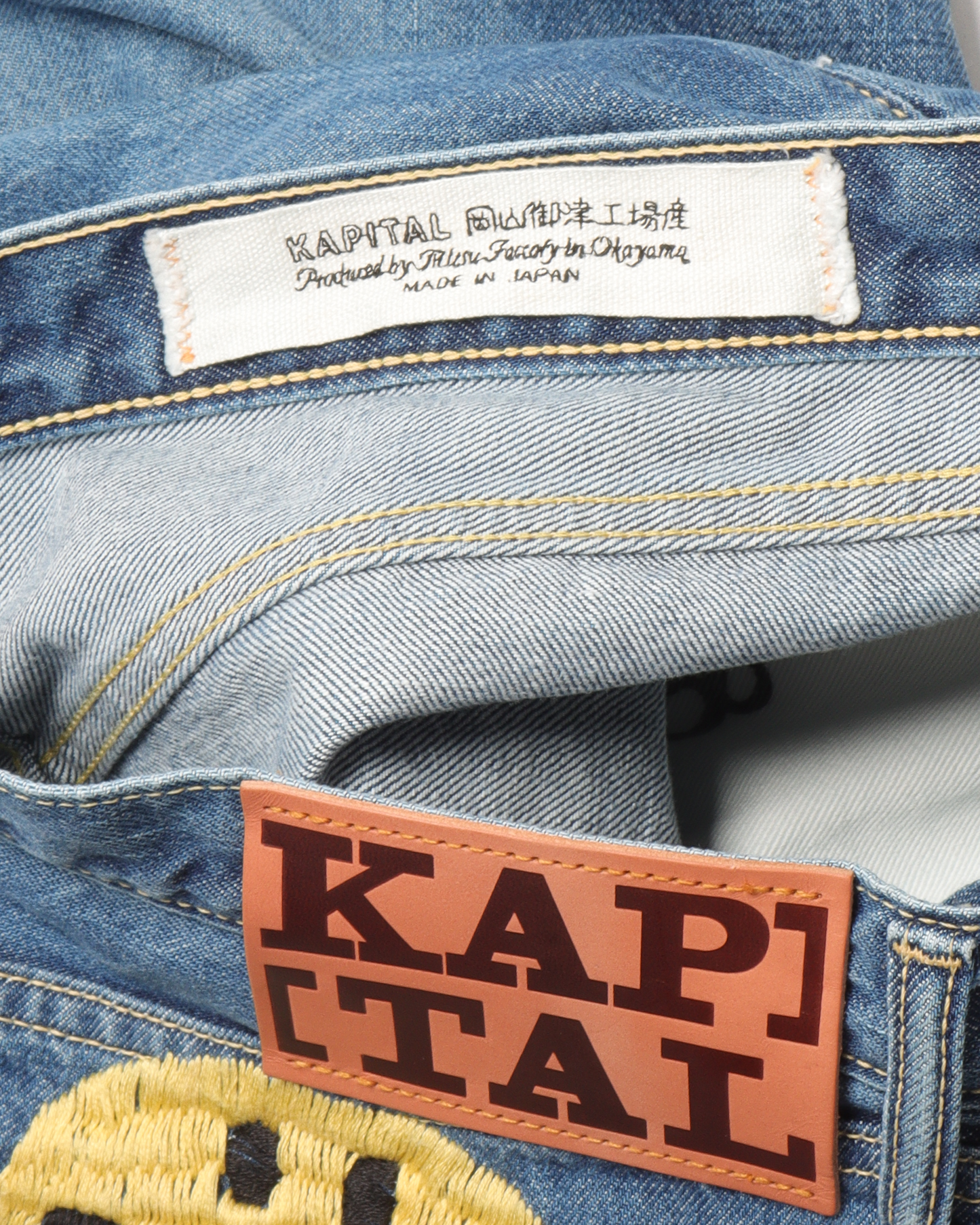 Smiley Face Embroidered Denim Jeans
