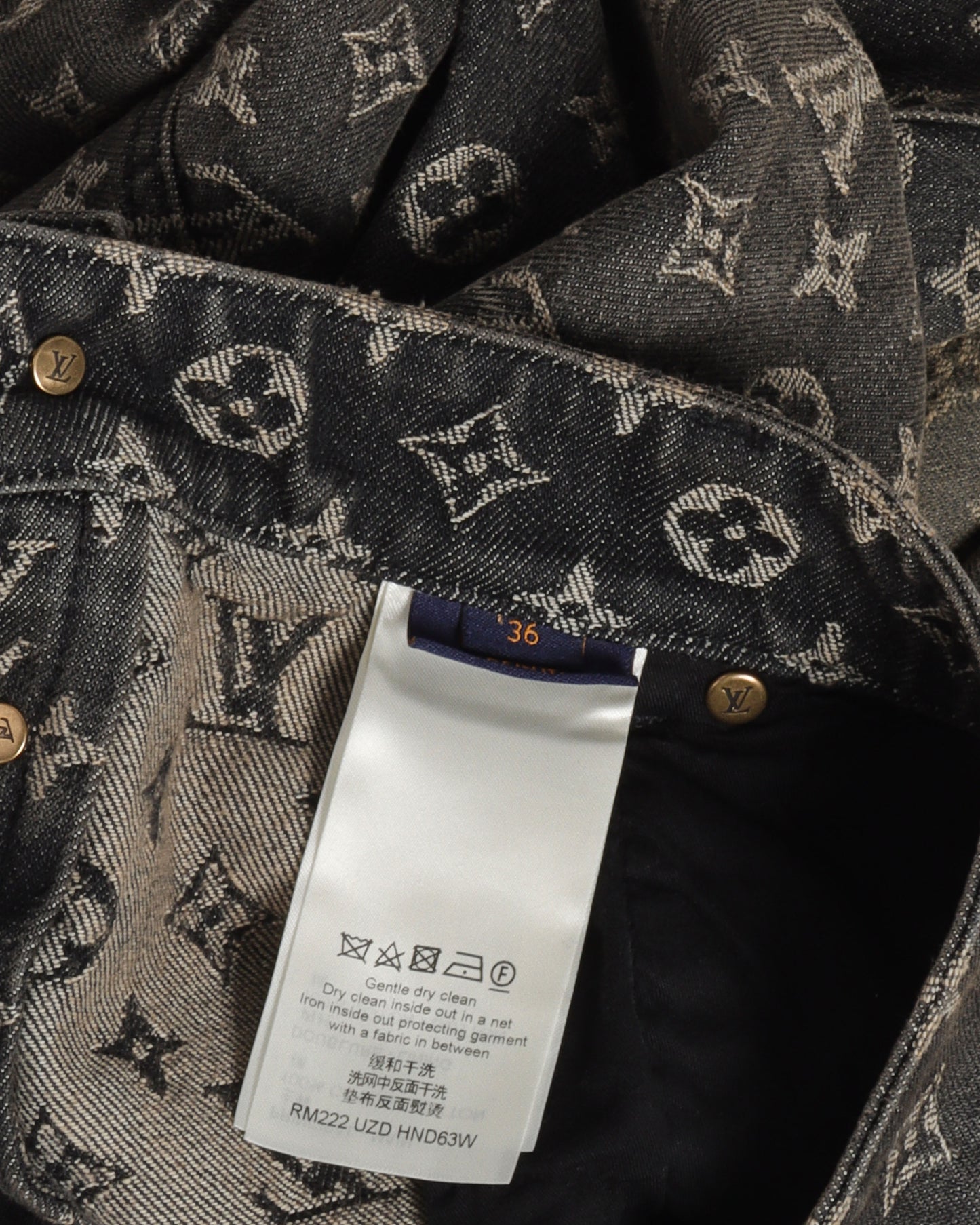 FW22 Distressed Baggy Monogram Jeans