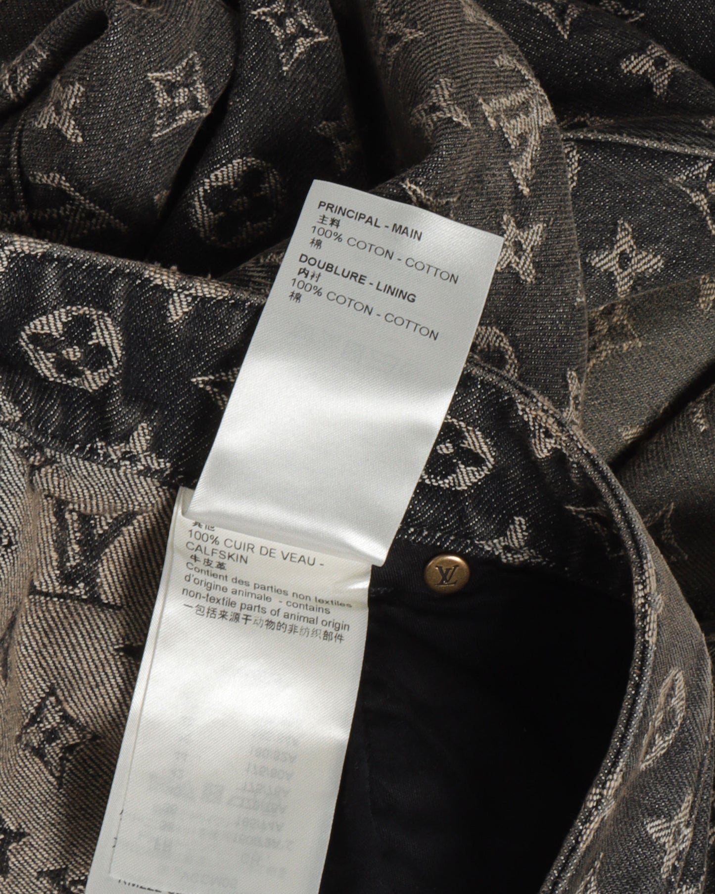 FW22 Distressed Baggy Monogram Jeans