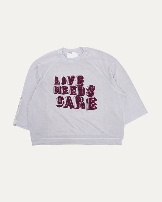 Love Needs Care Crewneck Sweatshirt