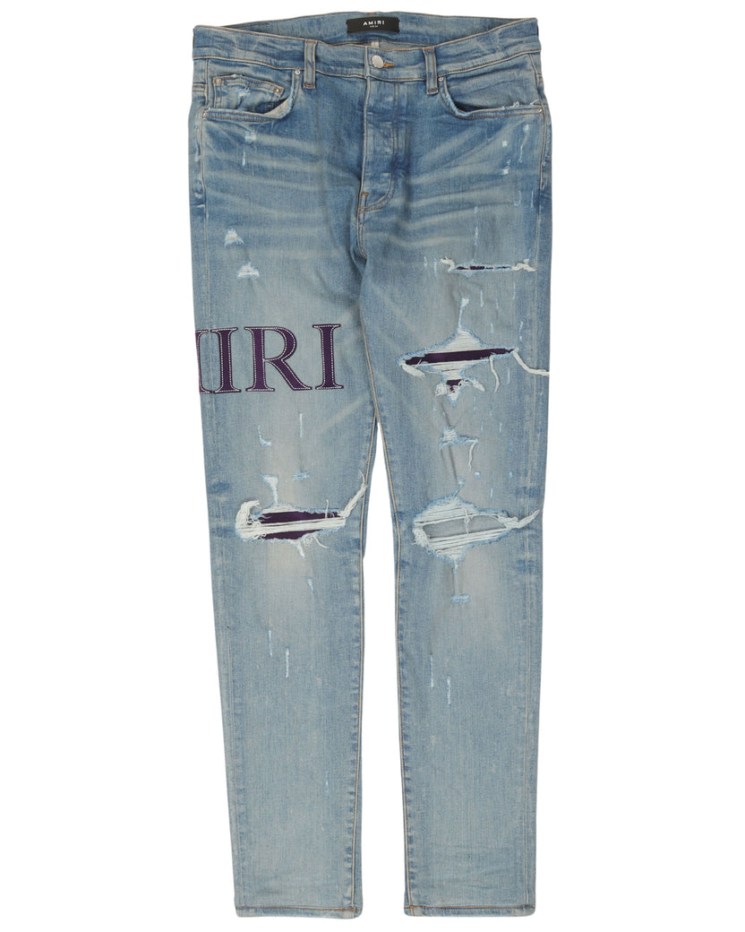 Distressed Logo Jeans