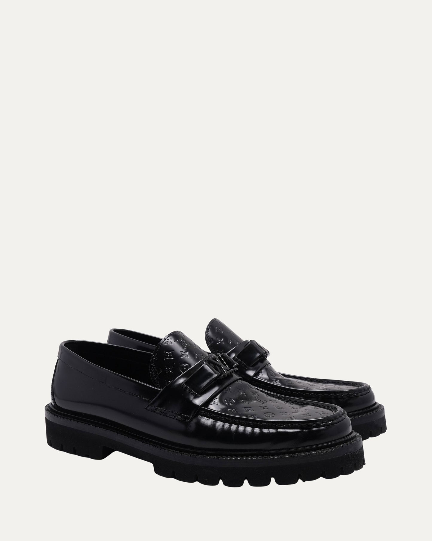Debossed Monogram Patent Leather Loafers