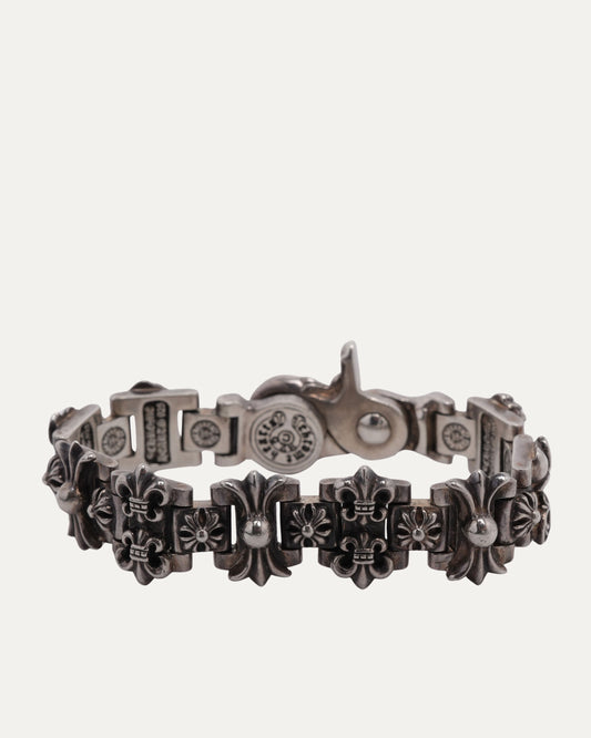 Fleur Lobster Clasp Multi Motif Bracelet