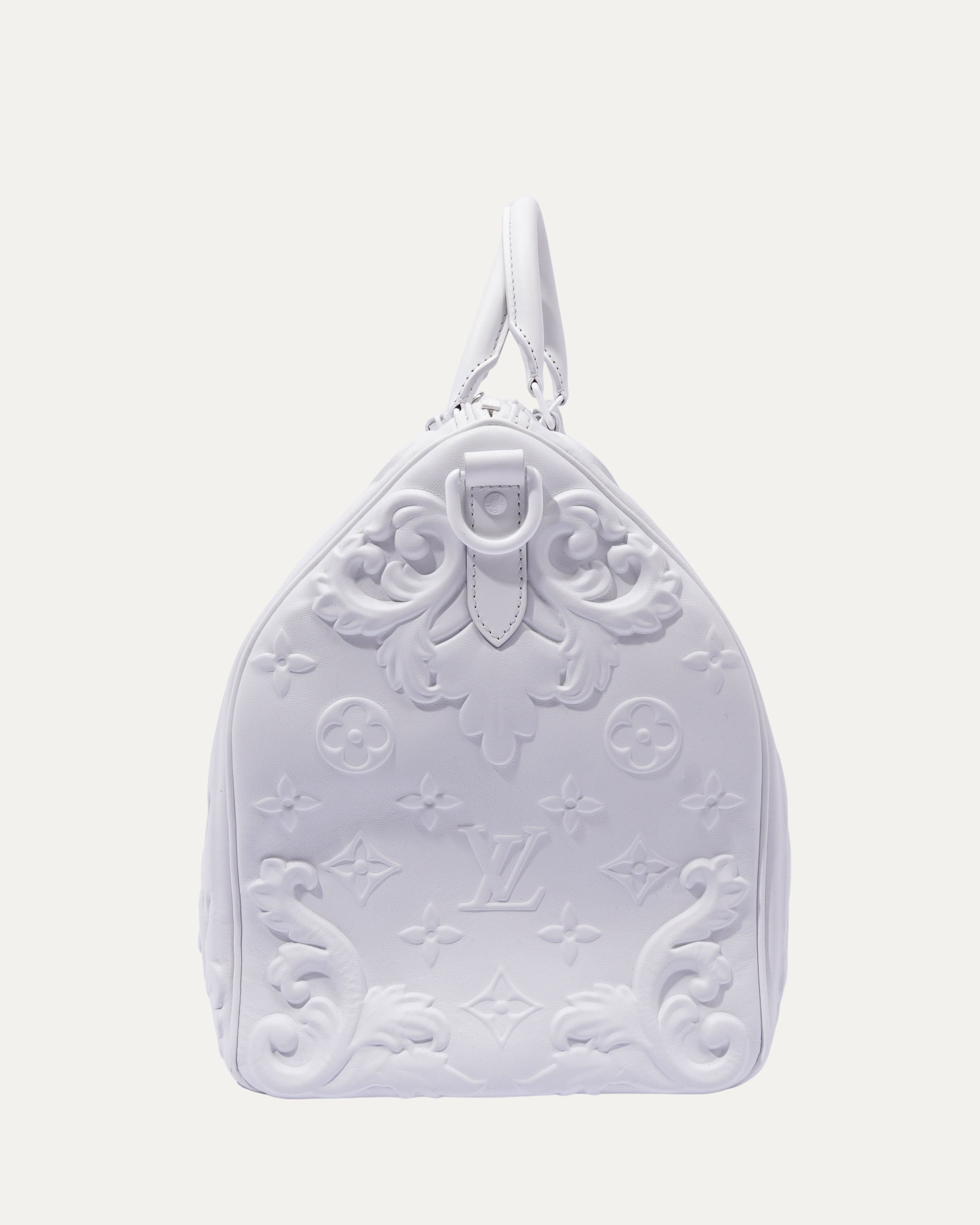 Optic White Embossed Monogram Keepall 50