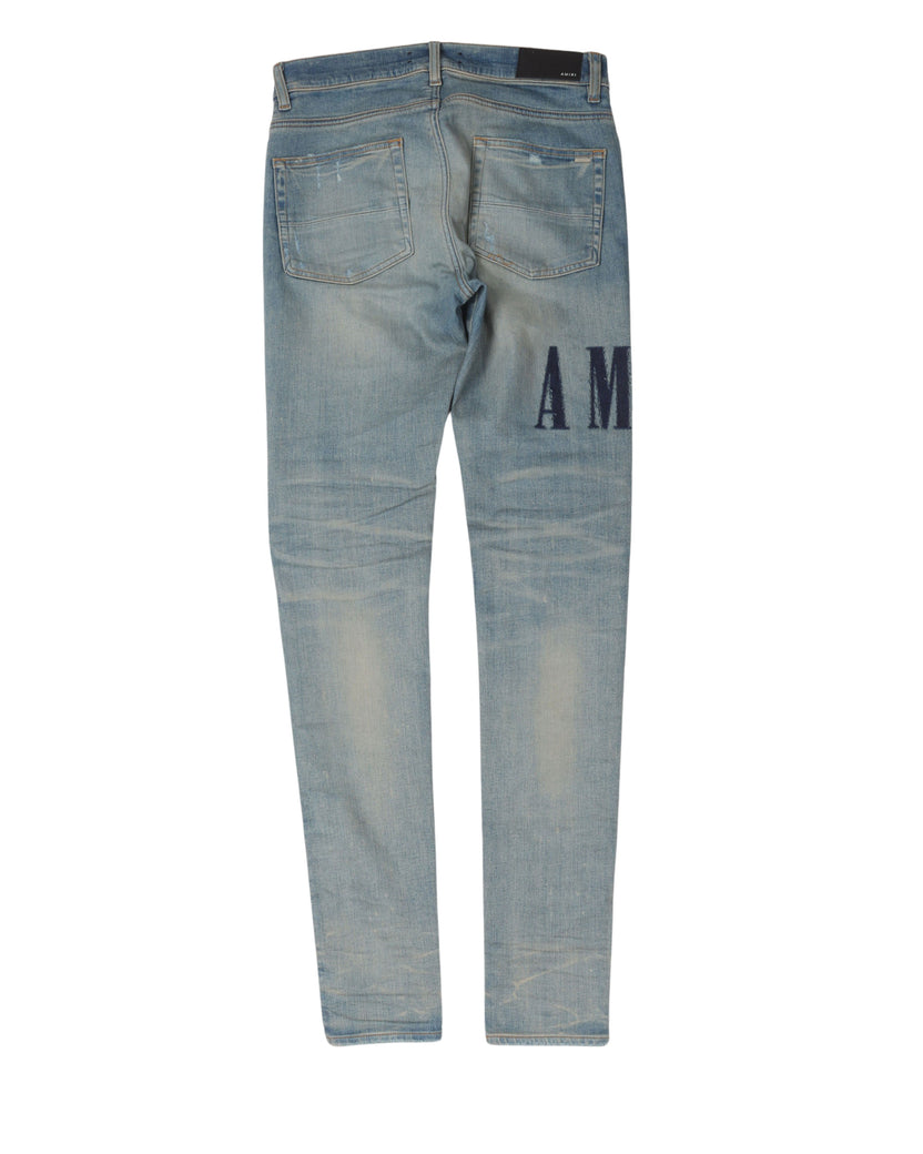 Distressed Repaired Denim Jeans with Logo