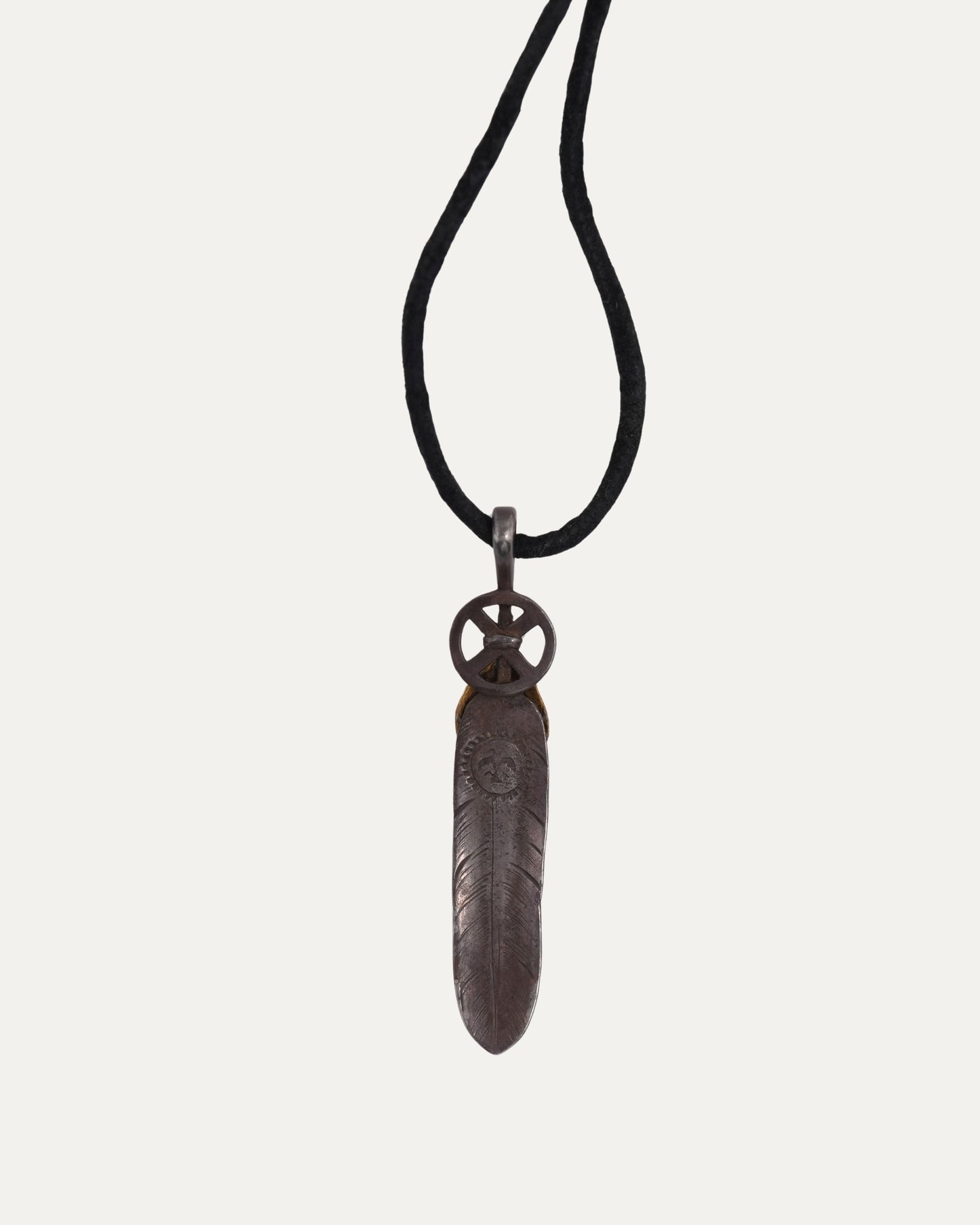 Small Feather Pendant on Leather Necklace