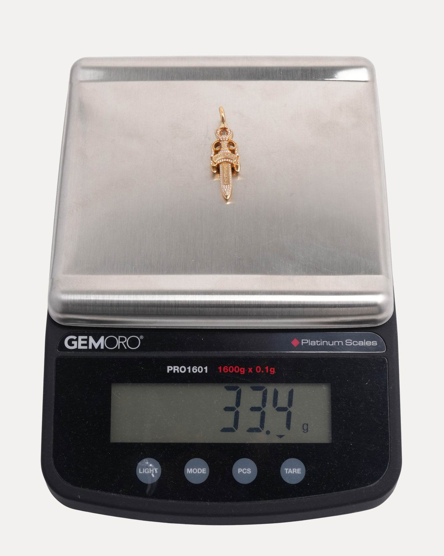 Gold Diamond Dagger Pendant