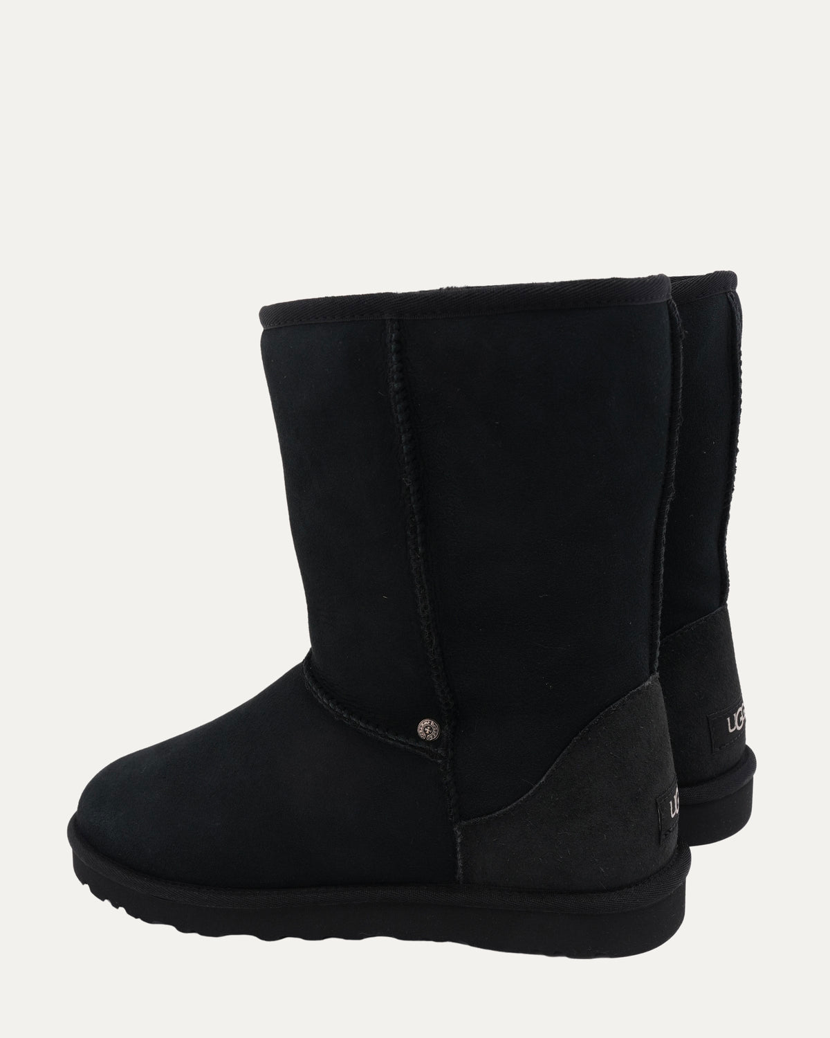 Cross Embellished Ugg Boots