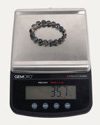 10mm Rutilated Quartz Plus Ball Graduated Bead Bracelet