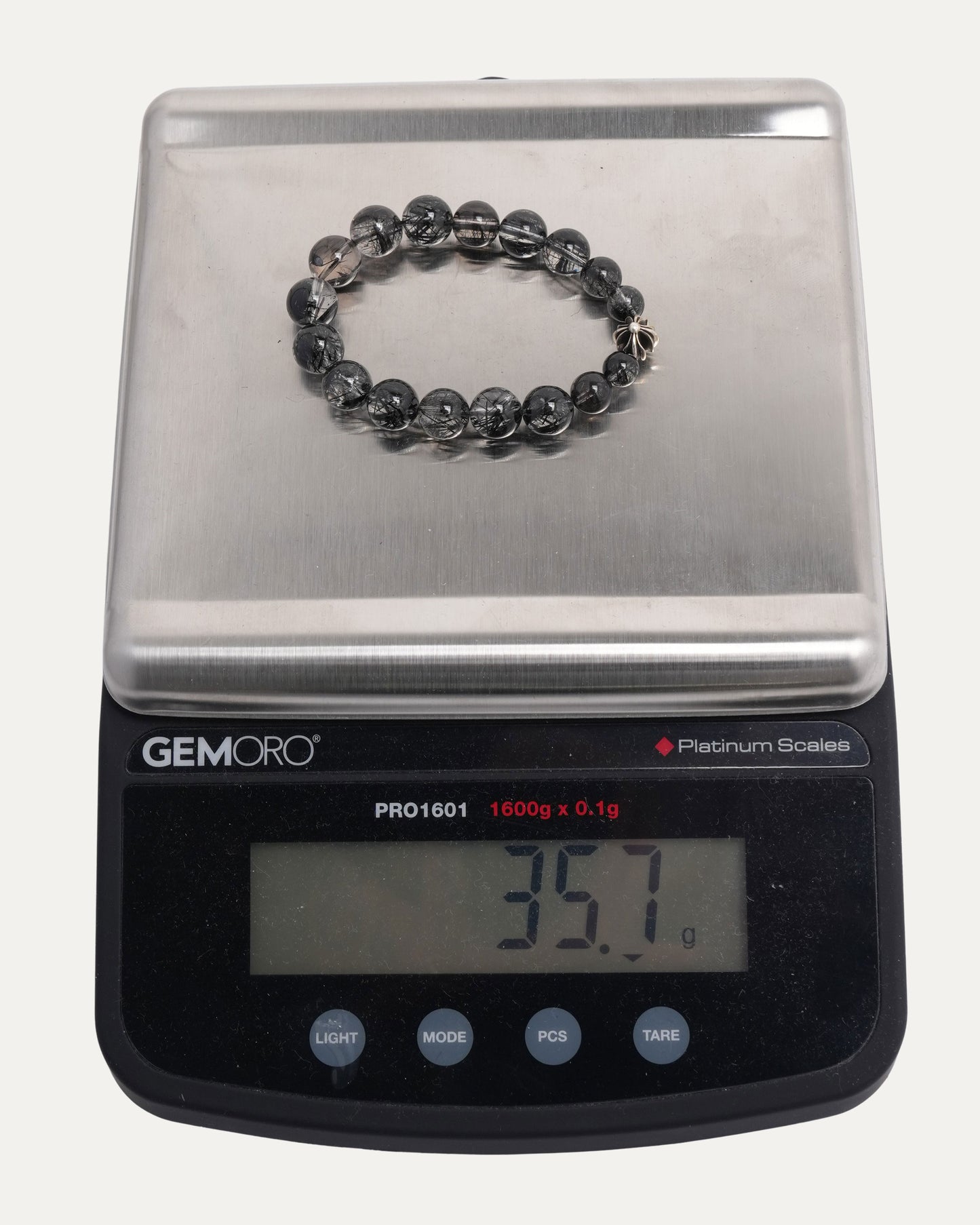 10mm Rutilated Quartz Plus Ball Graduated Bead Bracelet