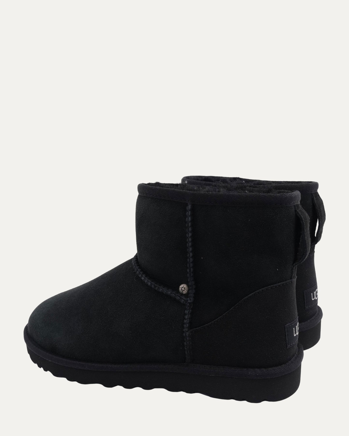 Dagger Embellished Ugg Mini Boots