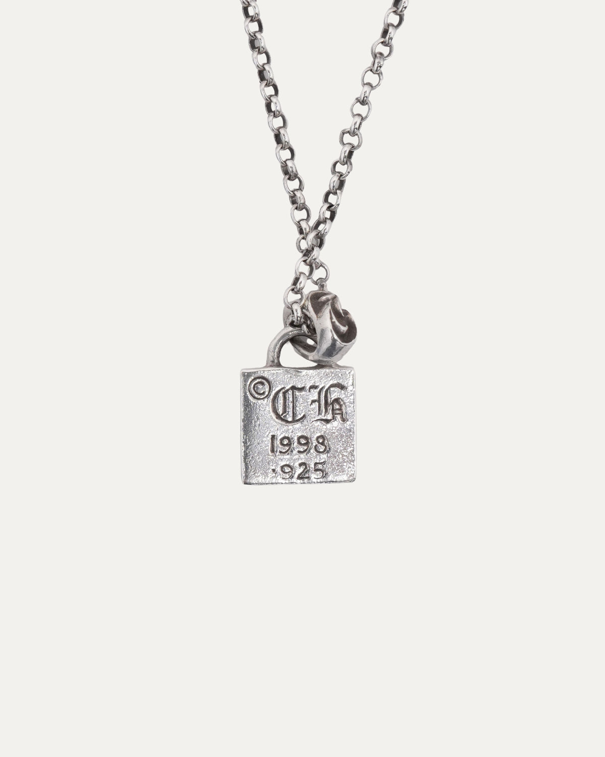 Framed Fleur Pendant on Roll Chain
