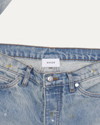 Distressed Button Hem Jeans
