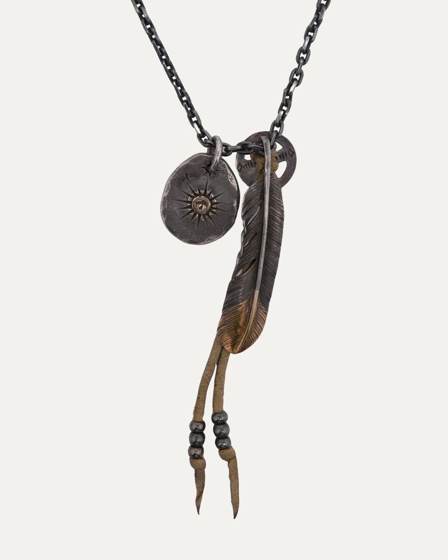 Thunderbird Disk Feather Pendant Necklace with Leather Accent