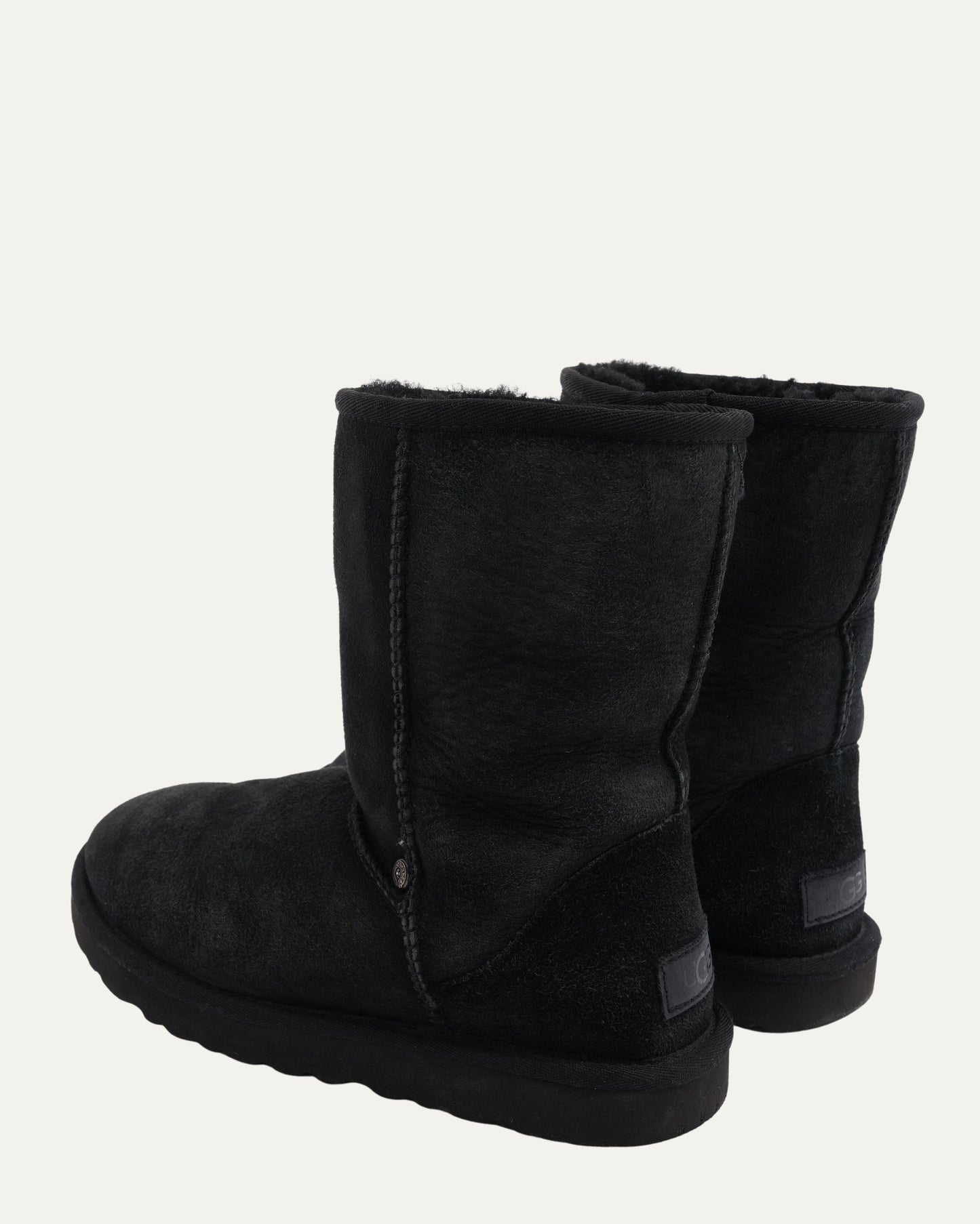 Cross Embellished Ugg Boots