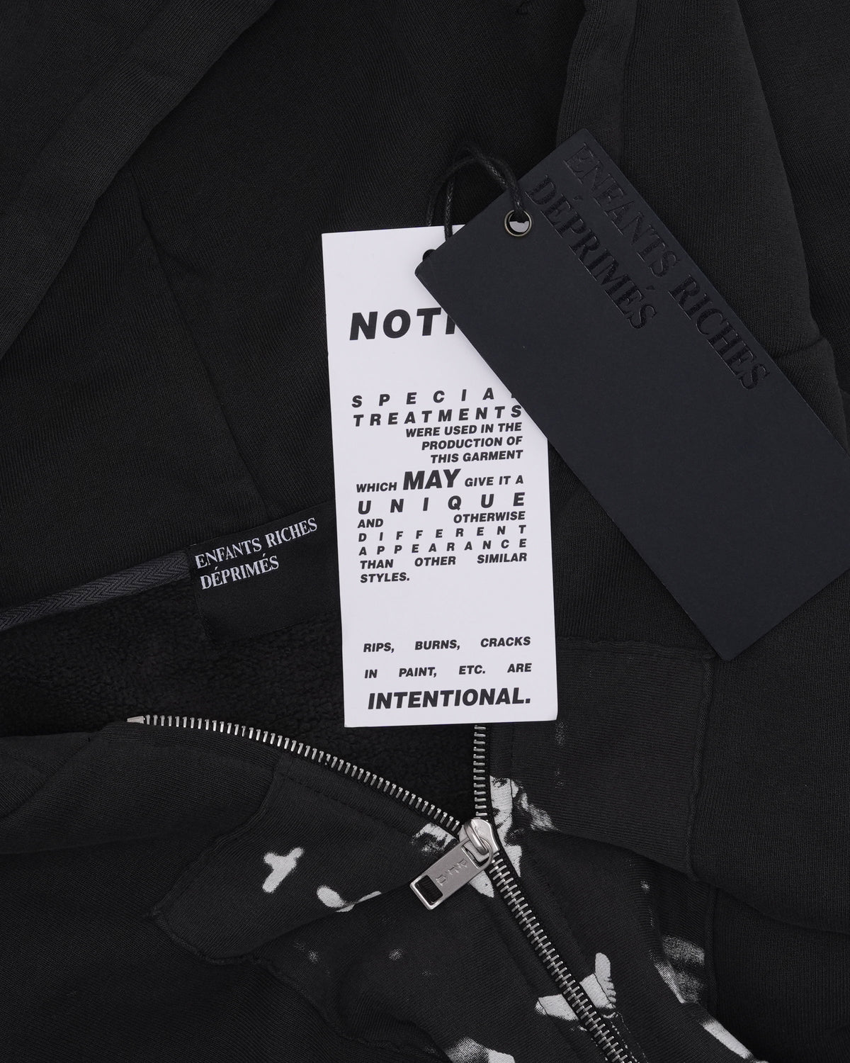 Artist Defends Baggy Assemblage Zip Up Hoodie