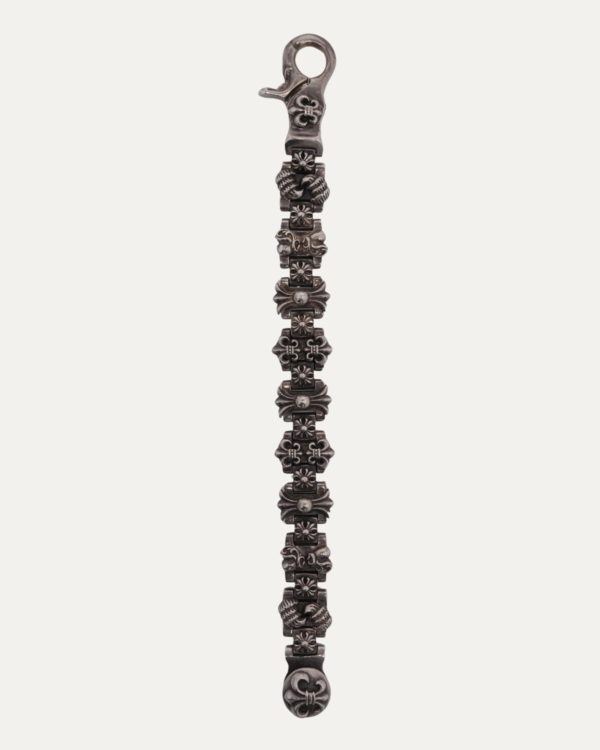 Fleur Lobster Clasp Multi Motif Bracelet