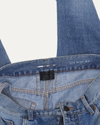 Distressed Slim Leg Jeans