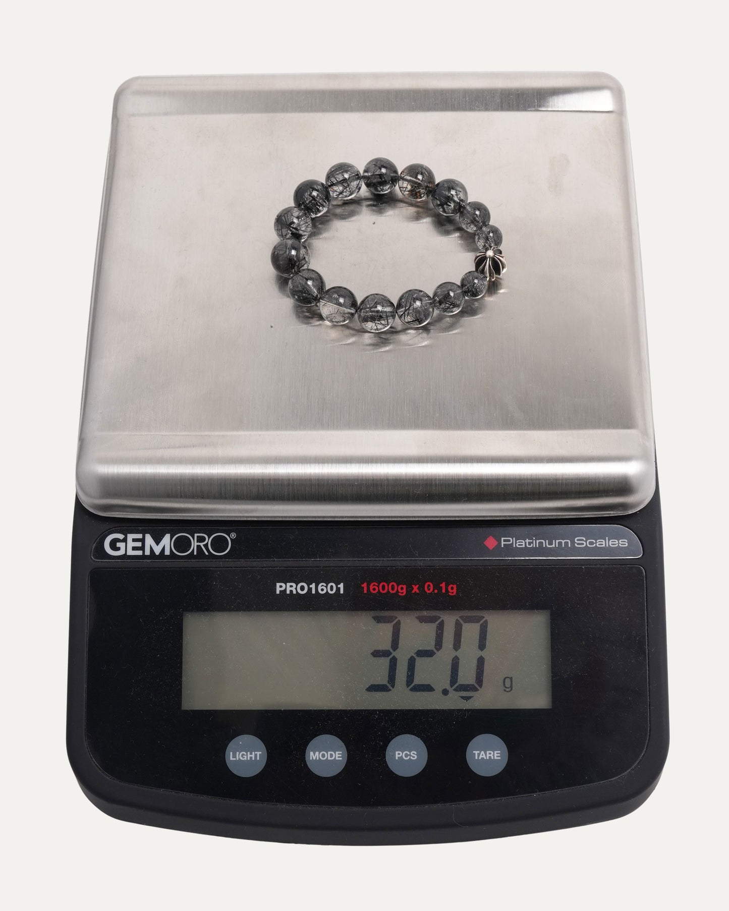 Graduated Rutilated Quartz Plus Cross Bead Bracelet