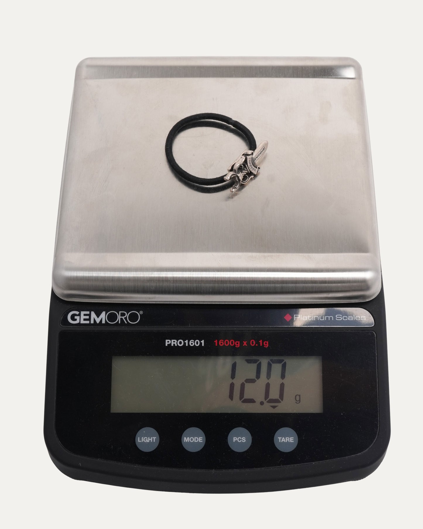 Dagger Embellished Hair Tie