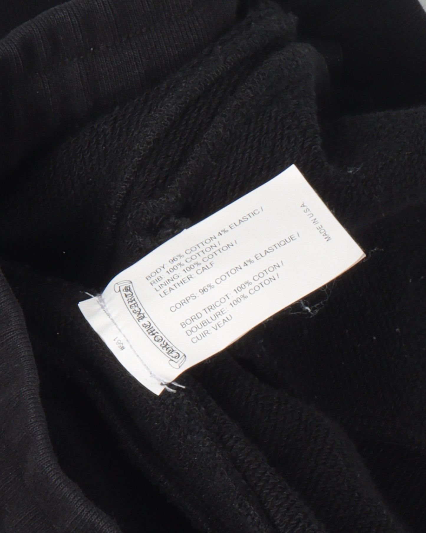 Tonal Eye Test Logo Leather Cross Patch Zipper Sweatpants