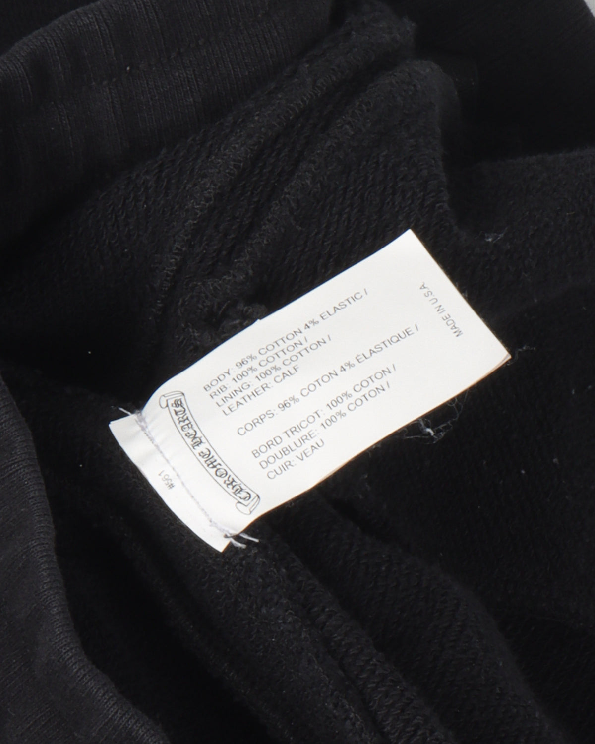 Tonal Eye Test Logo Leather Cross Patch Zipper Sweatpants