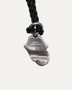 Rolling Stones Pendant on Braided Leather Necklace