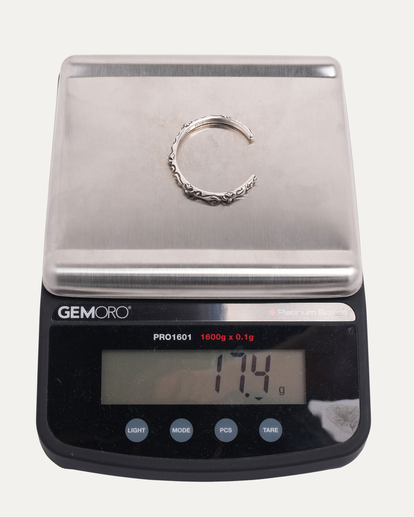 Scroll Plus Cross Bangle