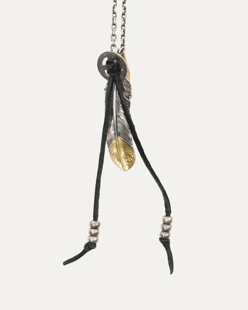 Silver Feather and Claw Pendant Necklace with Gold Detail