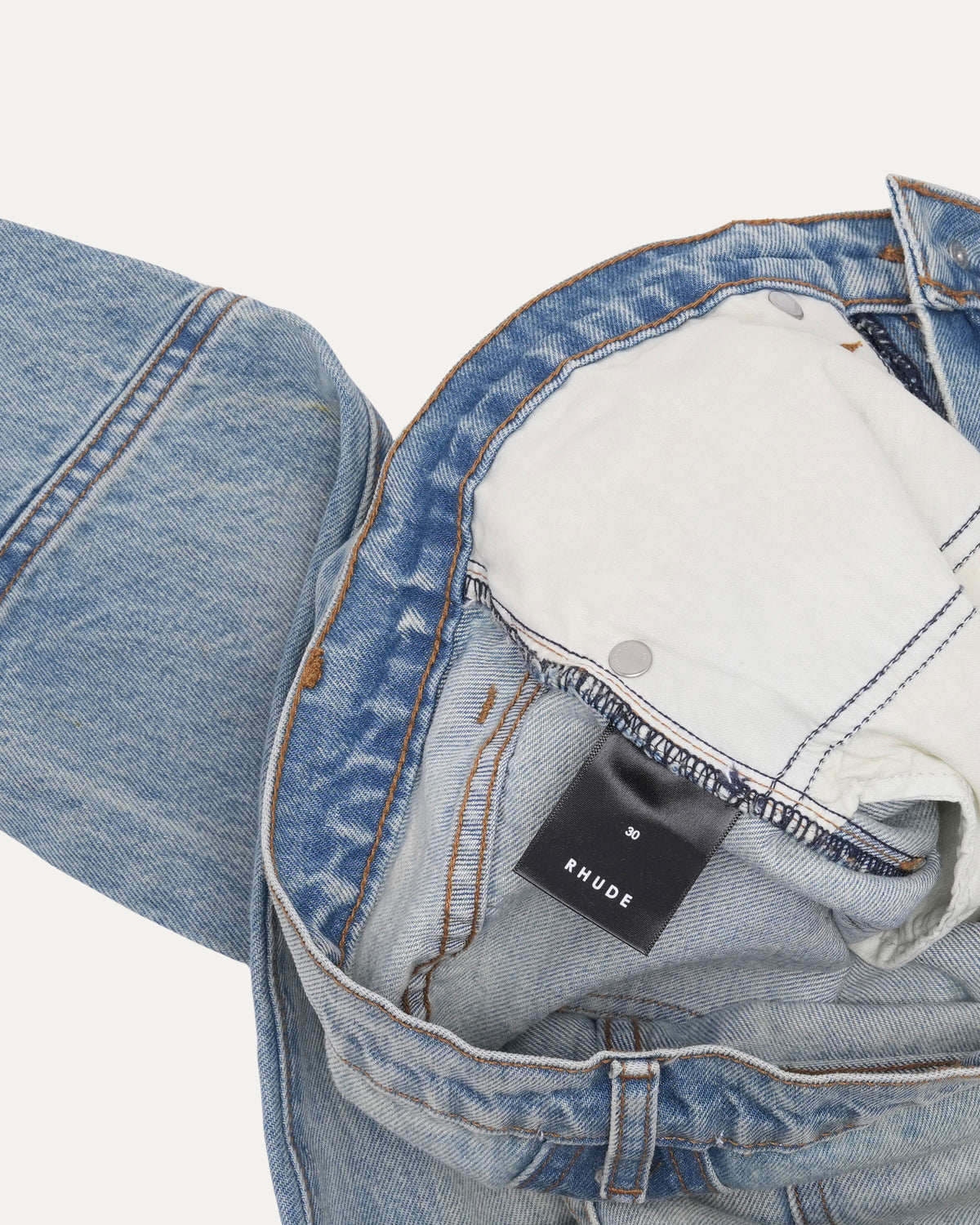 Distressed Button Hem Jeans