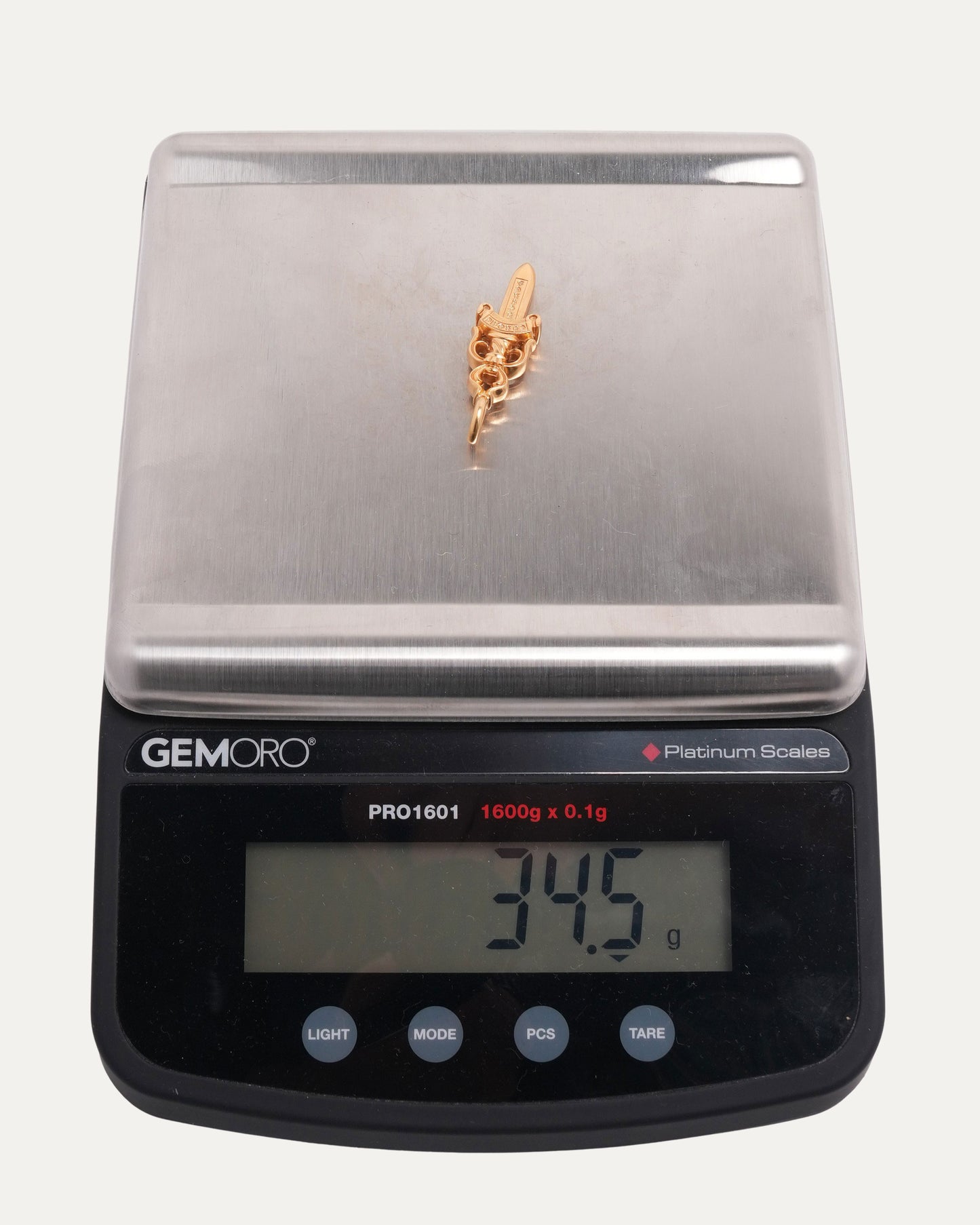 Large Gold Dagger Pendant